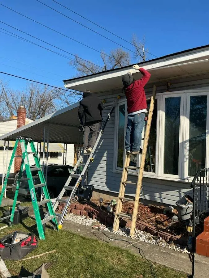 Restoration crew performing exterior repair in Columbus
