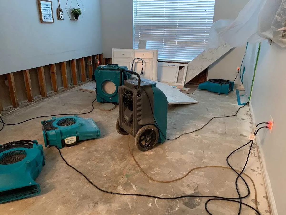 Dehumidifier in flood-cut room for Water Damage Restoration in Columbus